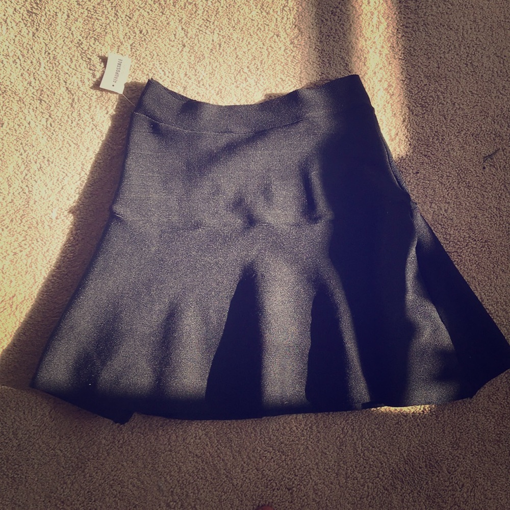 A black high waisted skirt brand new with tags